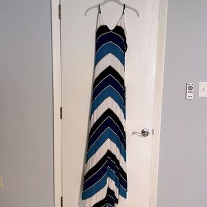 A beautiful BeBe maxi dress with spaghetti straps, and very soft material